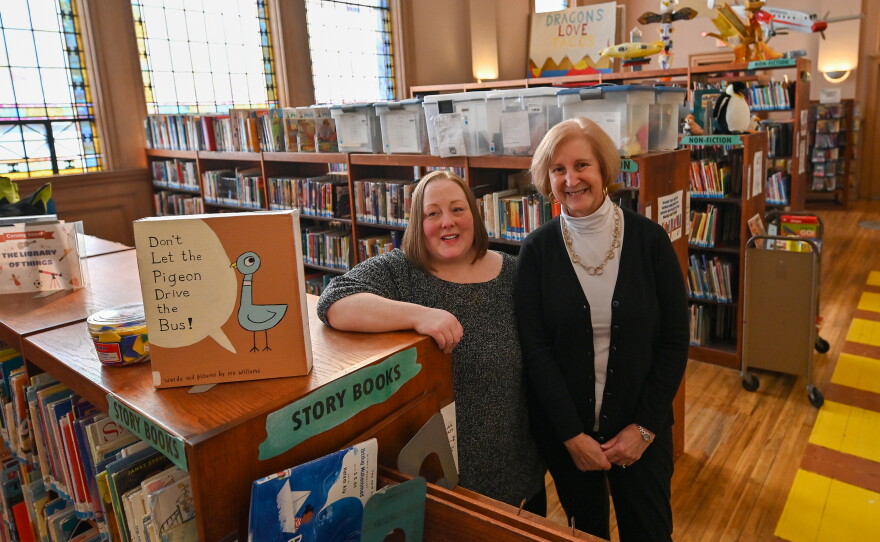 Sandy Longo (left) now serves as executive director of the Lackawanna Library System following Mary Garm's retirement.