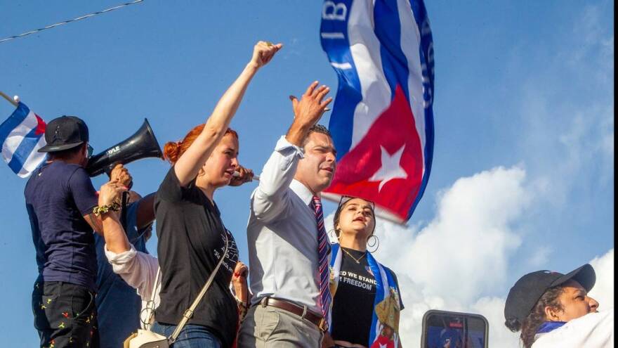BOMBING OUT Miami Mayor Francis Suarez (center, in tie) at a rally in Little Havana last month in support of Cuban anti-government protesters.
