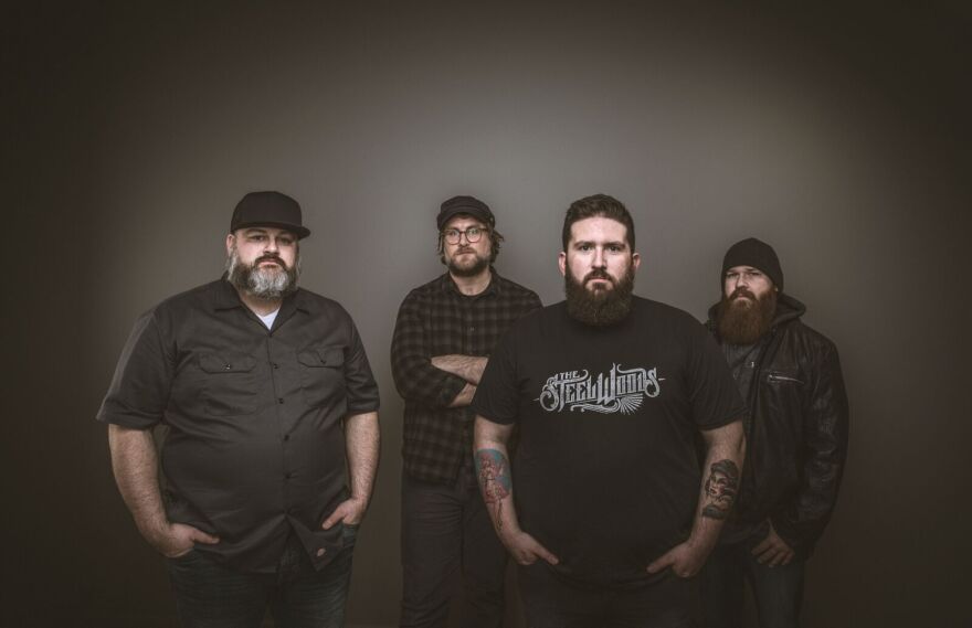 Drew Hale (center) says he adds northern Michigan flare to his country music.