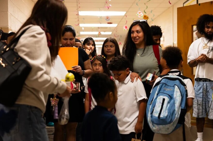 Students and parents walk through the halls of Mary Louise Phillips Elementary during Fort Worth ISD’s first day of school Aug. 12, 2025.