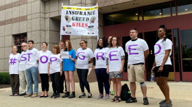 Members of the Connecticut Citizen Action Group protest against the proposed health insurance rate hikes by multiple carriers. They gathered Monday Aug. 21, 2023 as a public hearing was underway at the legislative building in Hartford.