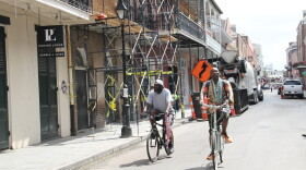 People bike through the French Quarter in quieter times. March 19, 2020.