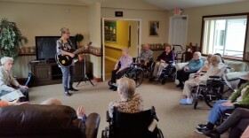 Mary Sue Wilkinson leads a sing-along session at Orchard Creek Supportive Care in Traverse City. Residents who suffer from dementia are still able to connect with the music from years before.