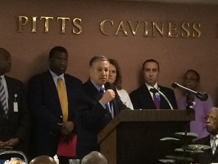Cuyahoga County Executive Armond Budish rallies a crowd of health care executives, advocates and community leaders. 
