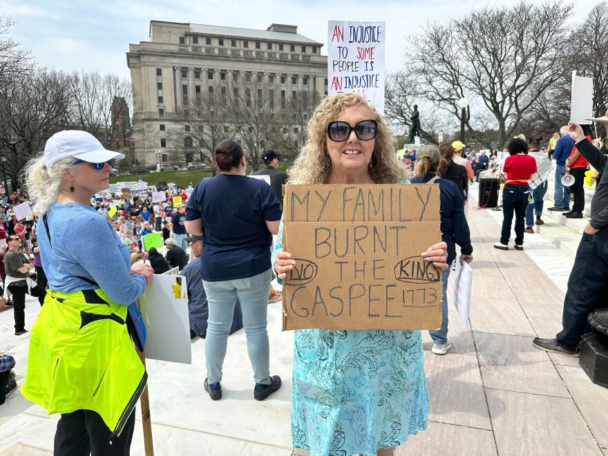 Protester Jann Campbell said her ancestors participated in the burning of the Gaspee in 1773 in a show of resistance against British tyranny. She said she sees today’s fight as a continuation of that.