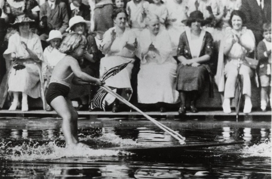 Jackie Ott "The Aqua Tot" aquaplaning at The Biltmore Hotel. He became famous for his performances starting at the Venetian Pool.