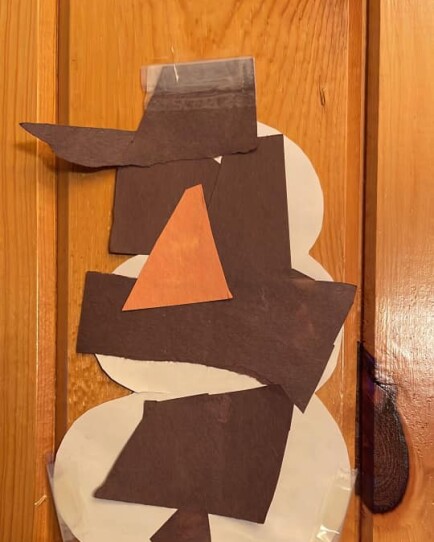 A construction paper snowman.