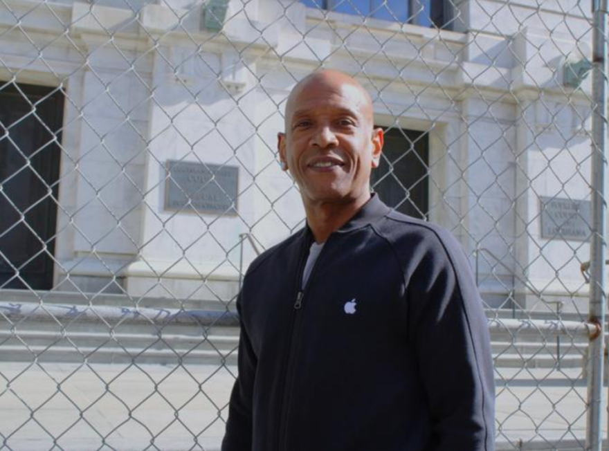 Kip Britton, a registered Louisiana court interpreter, stands outside the Supreme Courthouse on Royal Street in New Orleans on Sunday, Feb. 19, 2023.