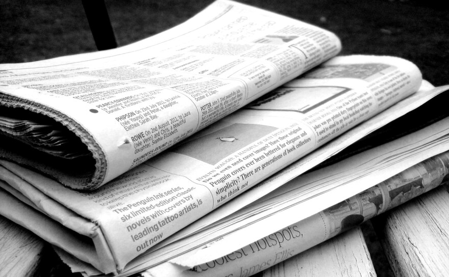 Newspapers in black and white