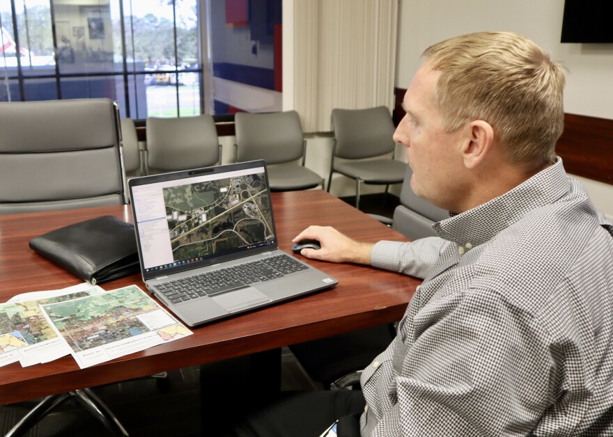 Brent Setchell, Florida Department of Transportation District 1 Design Drainage Engineer, is an advocate for wildlife crossings and shares the data and designs to create both wildlife overpasses and underpasses. In this photo, Setchell shows the future locations and designs for the designed overpass