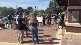 Cooper Neil directs the High School Hispanic Banda on September 27.