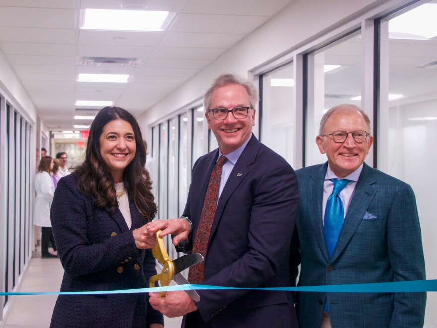 From left to right: U.S. Rep. Stephanie Bice, OK-5, Oklahoma Medical Research Foundation President Andrew Weyrich and OMRF Board Chairman Len Cason cut a ribbon as OMRF unveils its Center for Biomedical Data Sciences.