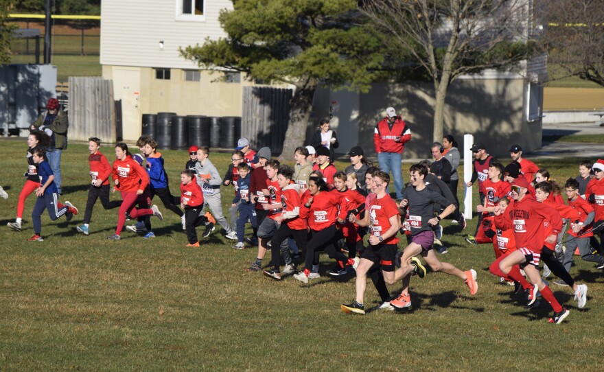 Hundreds of participants in the Redder For Edder Walk/Run take off at the start of the race Saturday, Nov. 22, 2025, at Parkside Junior High School in Normal. The race honors Edder Diaz, a PJHS cross-country team member who died Nov. 8 from injuries suffered in a Nov. 2 house fire. The event was a fundraiser to support the Diaz family.
