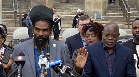 Juneteenth Executive Vice President Ras Jomo Okono delivers remarks during the raising of the Pan-African Liberation Flag in Niagara Square