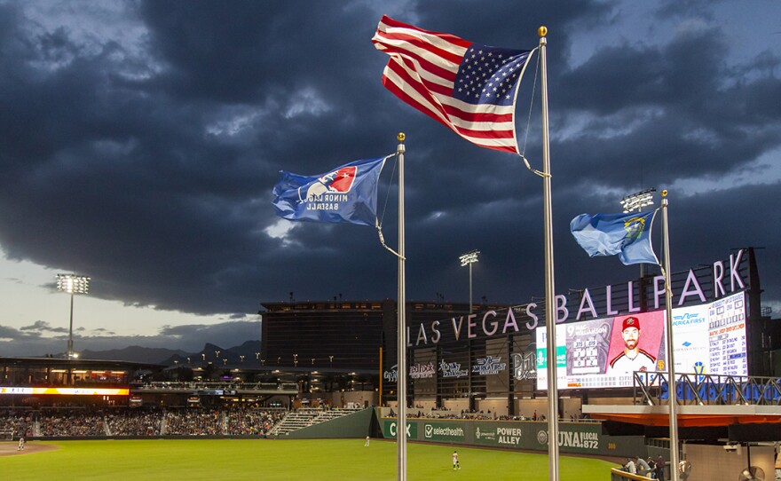 Flags fly in the high winds at Las Vegas Ballpark in Summerlin. Winds were forecasted during the game to reach upwards of 35 mph.