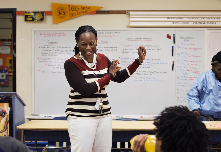 Darlene Donegan jokes with students in her government class at the Lieberman Learning Center.