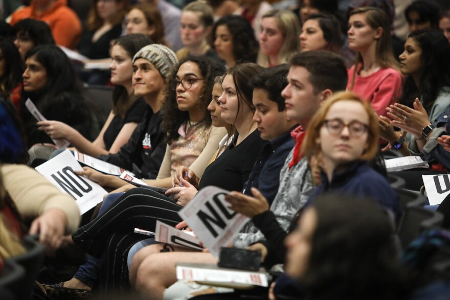 UT Austin students attend a town hall meeting on faculty sexual misconduct, in January.