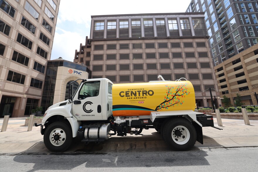 This vehicle waters trees and flowers downtown. Soon to be used in watering trees.
