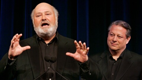 FILE - Former Vice President AL Gore, right, listens as movie director Rob Reiner addresses a Tribeca Film Festival news conference on a series of global warming-themed short films produced by the SOS (Save Our Selves) campaign which opened the festival in a gala hosted by Gore, April 25, 2007, in New York. (AP Photo/Richard Drew, File)