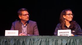 Candidate Nick Begich and U.S. Rep. Mary Peltola listen to the moderator at a 2022 debate in Kodiak. (Photo by Yereth Rosen/Alaska Beacon)