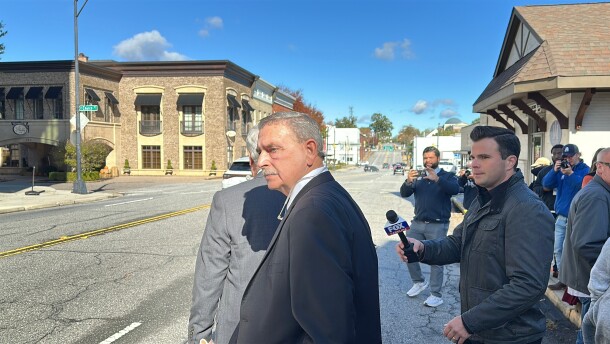 Former Spartanburg County Sheriff Chuck Wright walks out of court after pleading guilty to theft and conspiracy charges on Thursday, Oct. 30, 2025, in Anderson, S.C. (AP Photo/Jeffrey Collins)