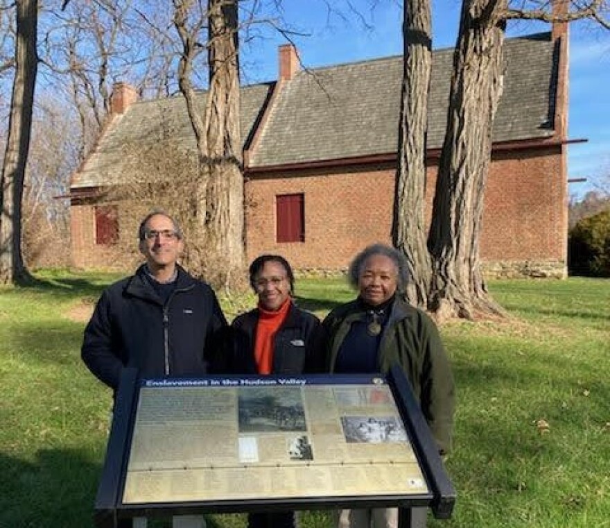 Vicki Jimpson-Fludd, right, with Leigh Fludd-Smith, center and Leigh’s husband Peter at the unveiling of the Columbia County Historical Society sign on African American history in the Hudson Valley at the Luykas Van Alen House in Kinderhook, NY