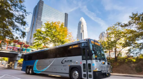 A Charlotte Area Transit System bus drives by uptown.