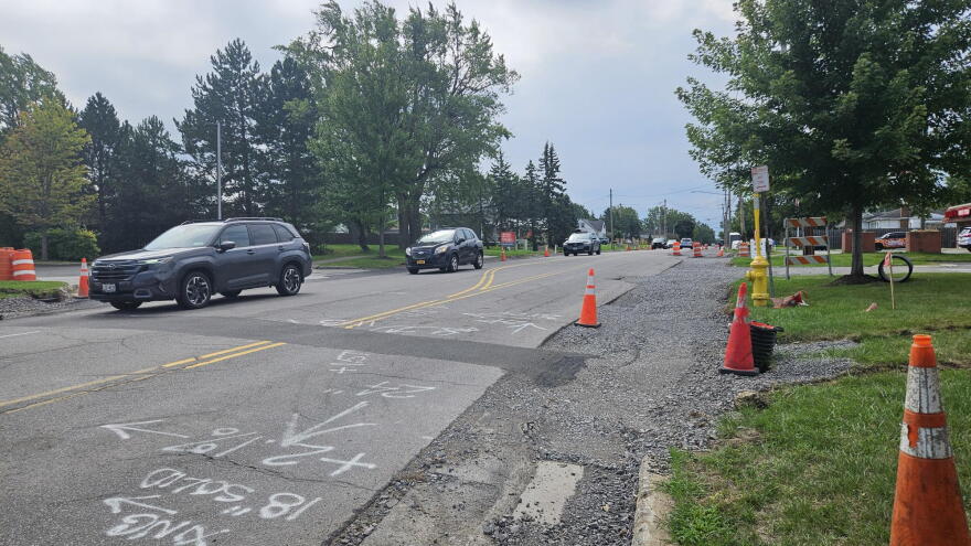 Vehicles drive along Borden Road near French Road. The section of Borden is the final part of a multi-year construction upgrade.