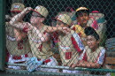 Members of the Little League team from Henderson, Nev., stand in their dugout during the sixth inning of the Little League World Series Championship baseball game against Curacao in South Williamsport, Pa., Sunday, Aug. 30, 2026. (AP Photo/Gene J. Puskar)