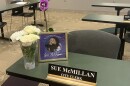 This is where Sue McMillan sat with city staff members during Pekin City Council meetings. On Monday, there were flowers and a framed photo to honor her. McMillan, who was the city clerk for 30 years, died last month.
