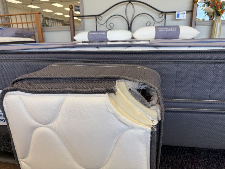 The company slices open its mattress to show people what's inside.