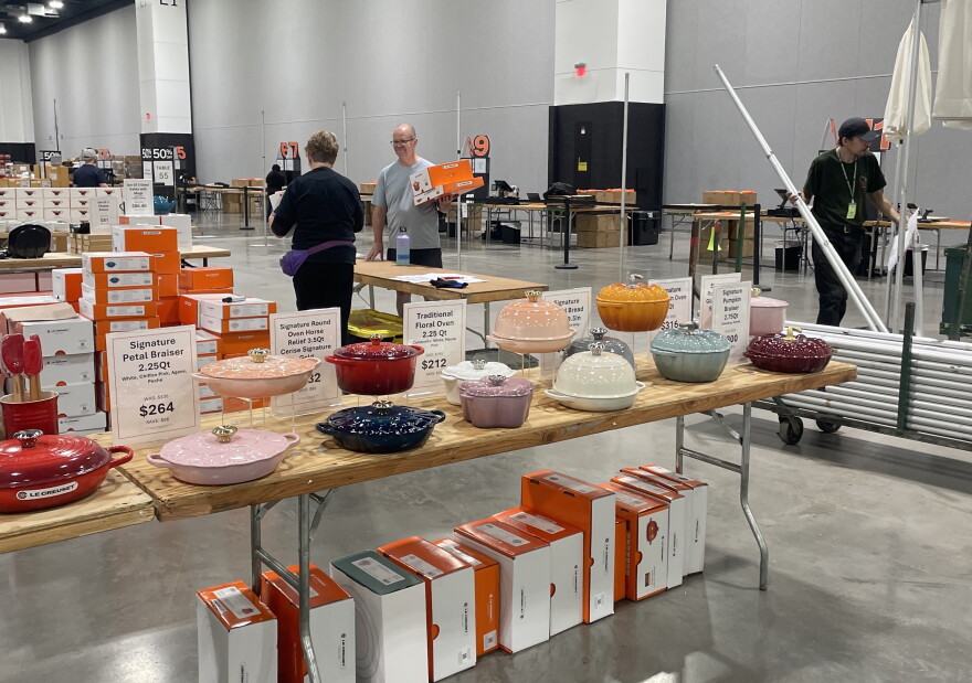 Rare items such as pumpkin-shaped dutch ovens and braising dishes with floral petal lids are displayed at the Le Creuset Factory-to-Table sale in Milwaukee on Oct. 1, 2026.