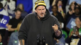 Sen. John Fetterman, D-Pa., speaks at a campaign rally for Democratic presidential nominee Vice President Kamala Harris at Erie Insurance Arena, in Erie, Pa., Oct. 14, 2024.