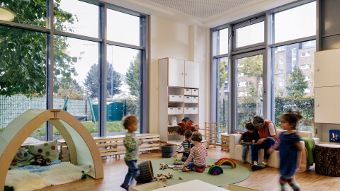 Children playing in the learning room at their daycare center.