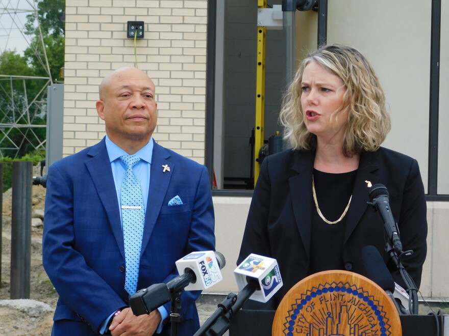 Flint Mayor Sheldon Neeley (left) and EGLE Director Liesl Clark at a news conference at the Flint water plant