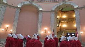 Abortion ban protestors dressed in Handsmaid Tale costumes at Ohio Statehouse