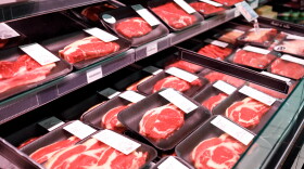 Showcase beef steaks meat products in a supermarket