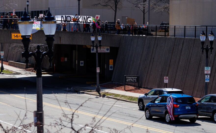 Thousands gathered at the Michigan Capitol in Lansing, Mich., on March 28, 2026, for a No Kings rally.