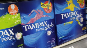 Boxes of tampons are displayed in a pharmacy, Monday, March 7, 2016, in New York.