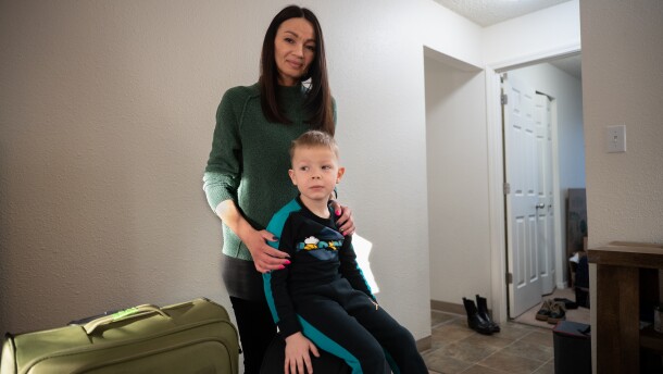 Olena Dubchenko and her son Maksim, 4, in their Anchorage apartment before leaving to Seattle on March 27, 2026.
