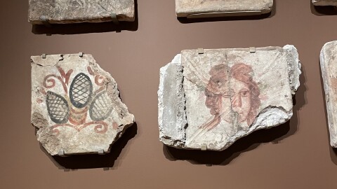 Tiles inspired by zodiac symbols and Roman mythology recovered from a synagogue in Dura-Europos, in present-day Syria.