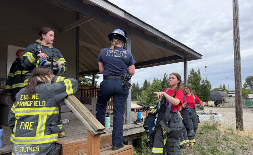 Campers take a break between practice car fire drills, June 25, 2026.