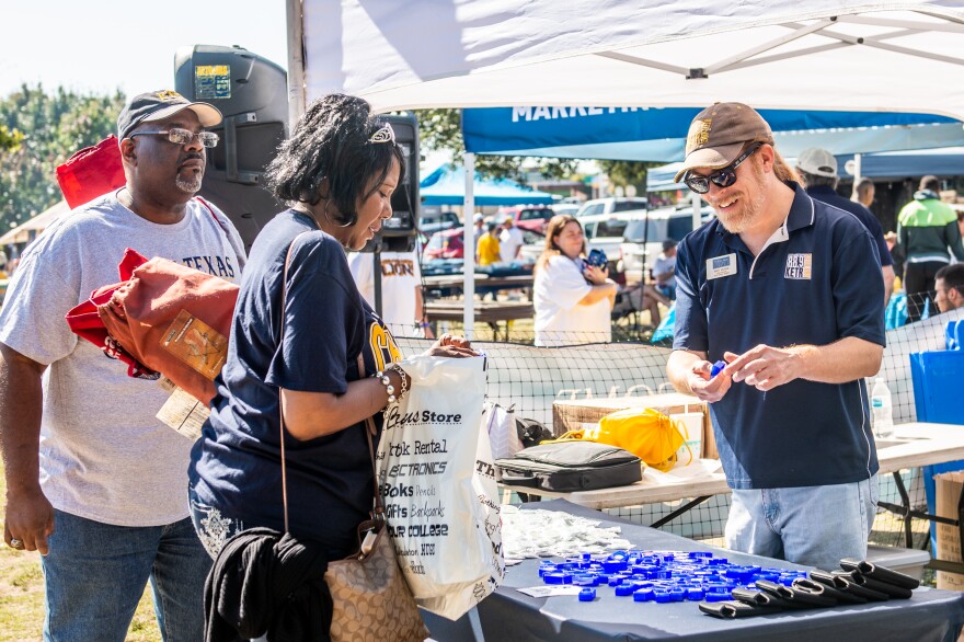 Matt Meinke interacts with KETR listeners at one of many TAMUC Lions Tailgate opportunities over the years.