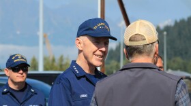 28th Commandant of the U.S. Coast Guard Admiral Kevin Lunday (center) speaks with U.S. Sen. Dan Sullivan in the JAG Alaska shipyard on Monday, Aug. 10, 2026 in Seward, Alaska.