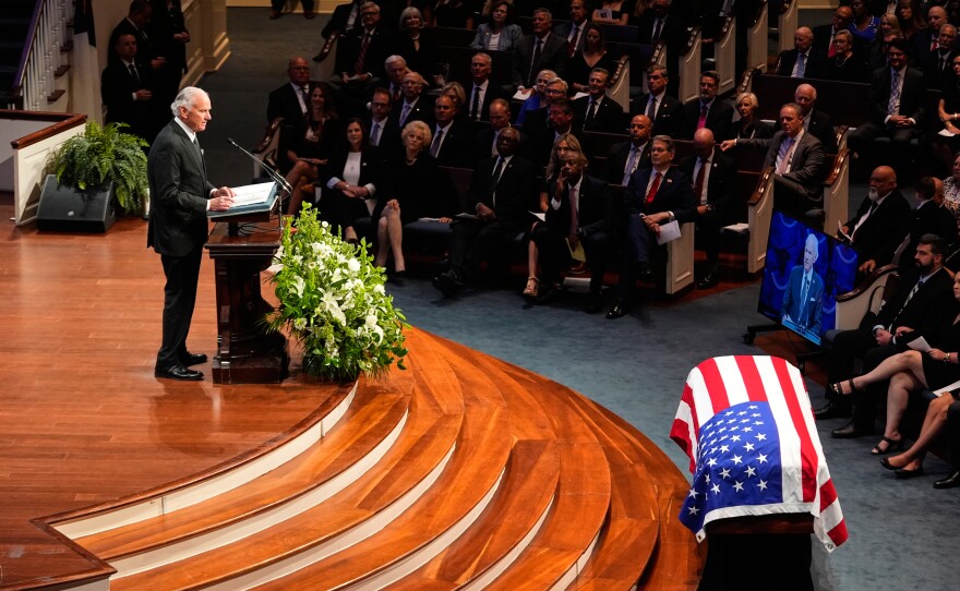 South Carolina Gov. Henry McMaster speaks as the casket of the late Sen. Lindsey Graham, R-S.C., sits at the front of First Baptist Church in Columbia, S.C., for a funeral service, Wednesday, July 29, 2026. (AP Photo/Gerald Herbert)
