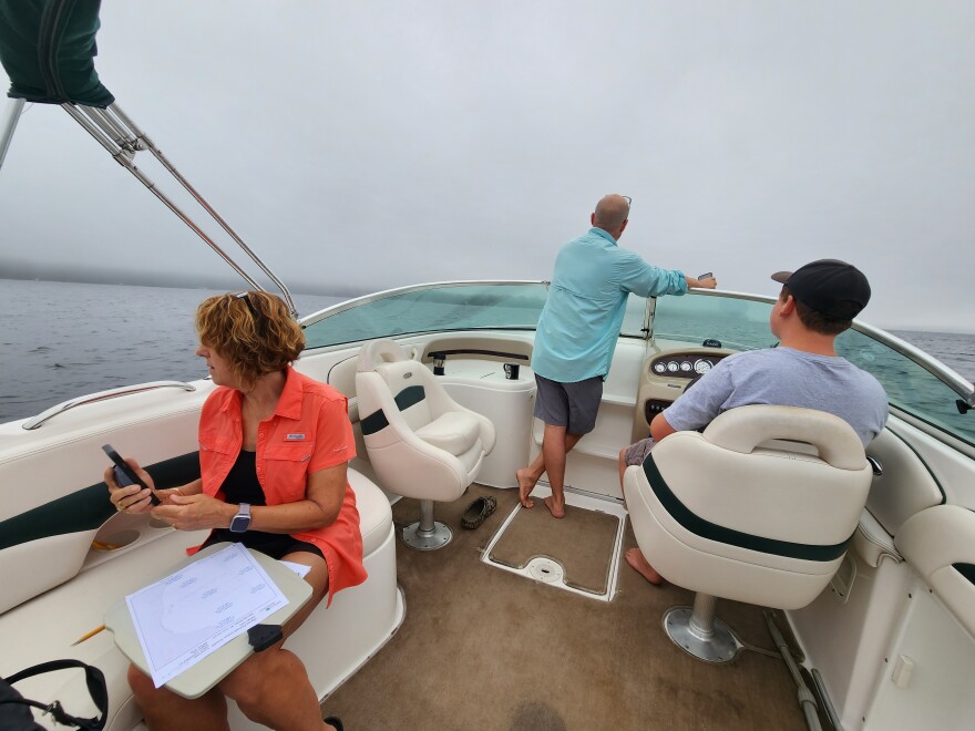 The Bruni family on their boat in Jordan Bay on Sebago Lake on July 15, 2023.