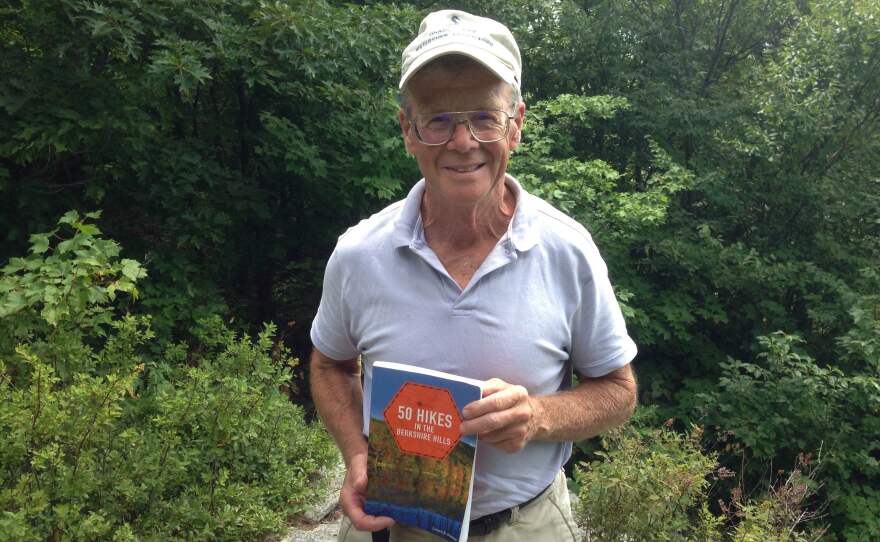 Lauren Stevens holding his book "50 Hikes in the Berkshire Hills"