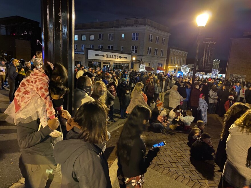 Dozens gathered outside Belmont City Hal Monday for the annual tree-lighting ceremony.