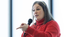 Eugene Field Elementary School third grade teacher Megan McQuinn speaks to her students about their popcorn-selling fundraiser during lunch Jan. 27. McQuinn said the fundraising activity helps students build skills they’ll use later in life.
