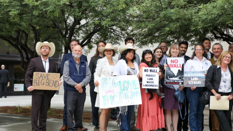 Anti-wall advocates and plantiffs gather for a group photo outside of a federal courthouse in El Paso on Friday, October 2.